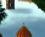 Reflection of hot air balloon in the canal