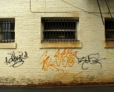 grafitti-on-painted-brick-building-Lewiston_DSC08489
