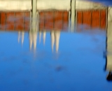 parking-garage-and-Basilica-reflected-in-puddle-Lewiston_DSC03301