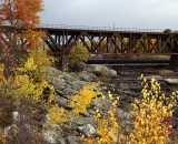 Railroad trestle above Great Falls in autumn