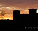 Hill Mill silhoueted against sunrise sky