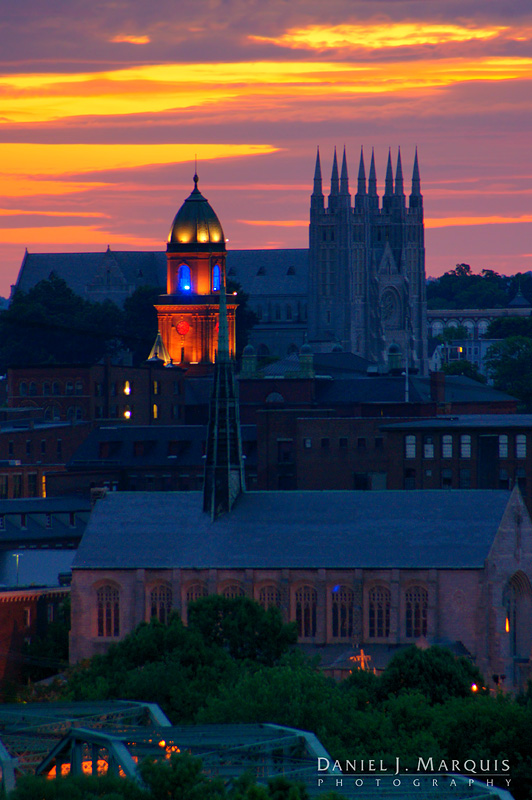 dawn breaks over Lewiston, Maine, with City Hall, Saints Peter and Paul Basilica and Franco Center